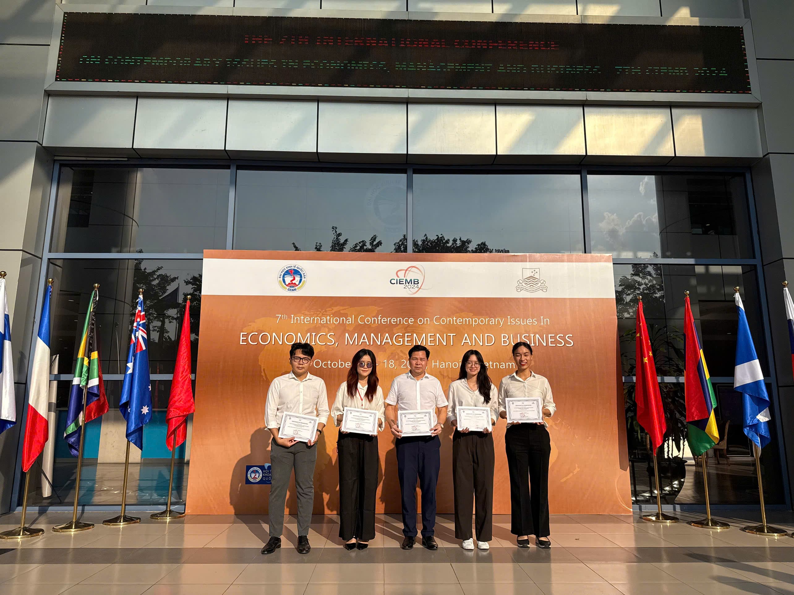 Nam Anh Le with conference presentation collaborators at CIEMB 2024